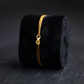 Preview: 1,5 mm braunes Nylonarmband mit vergoldetem Infinity-Zeichen - Infinity Brown Gold